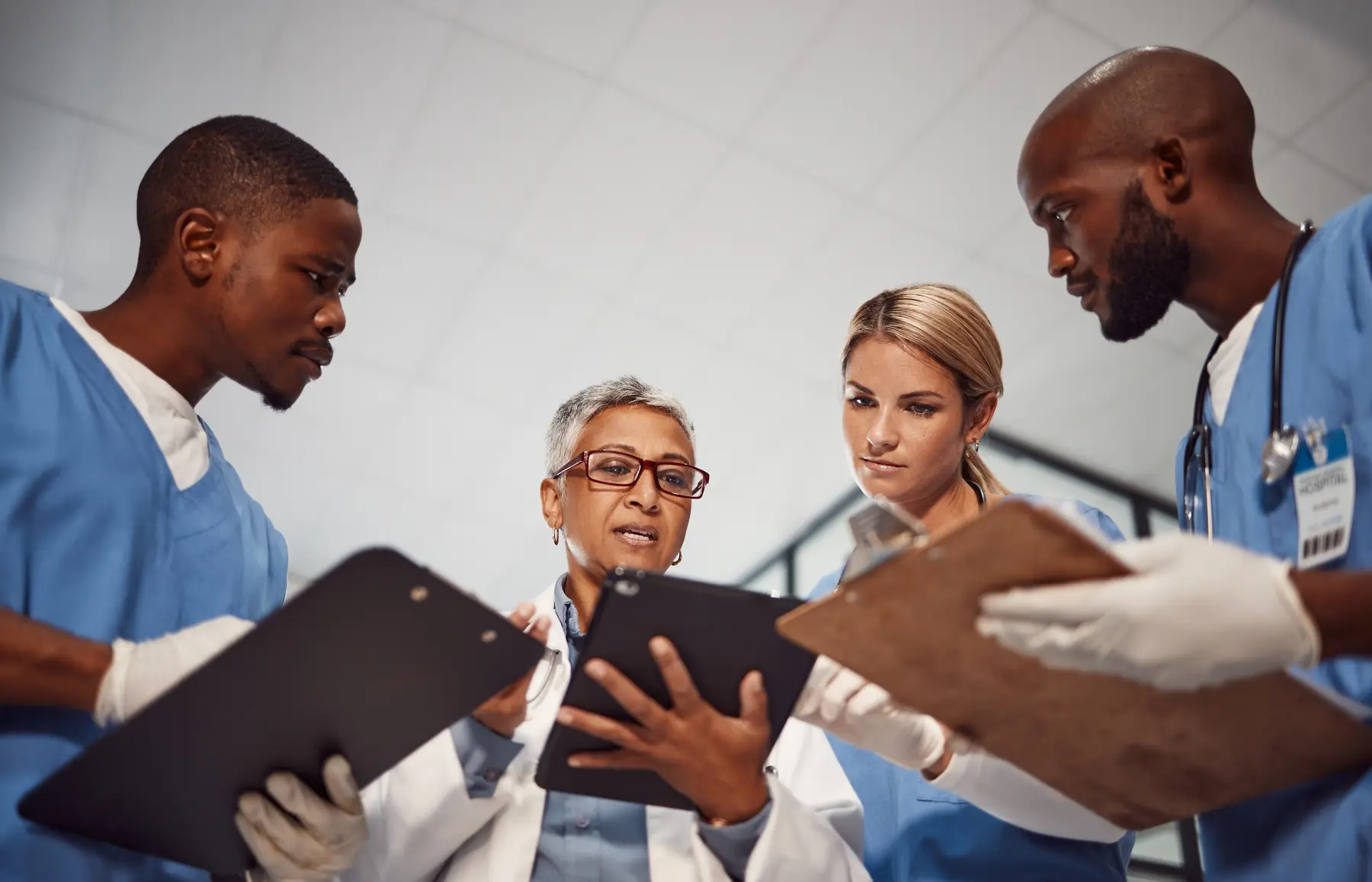 Healthcare professionals reviewing information together