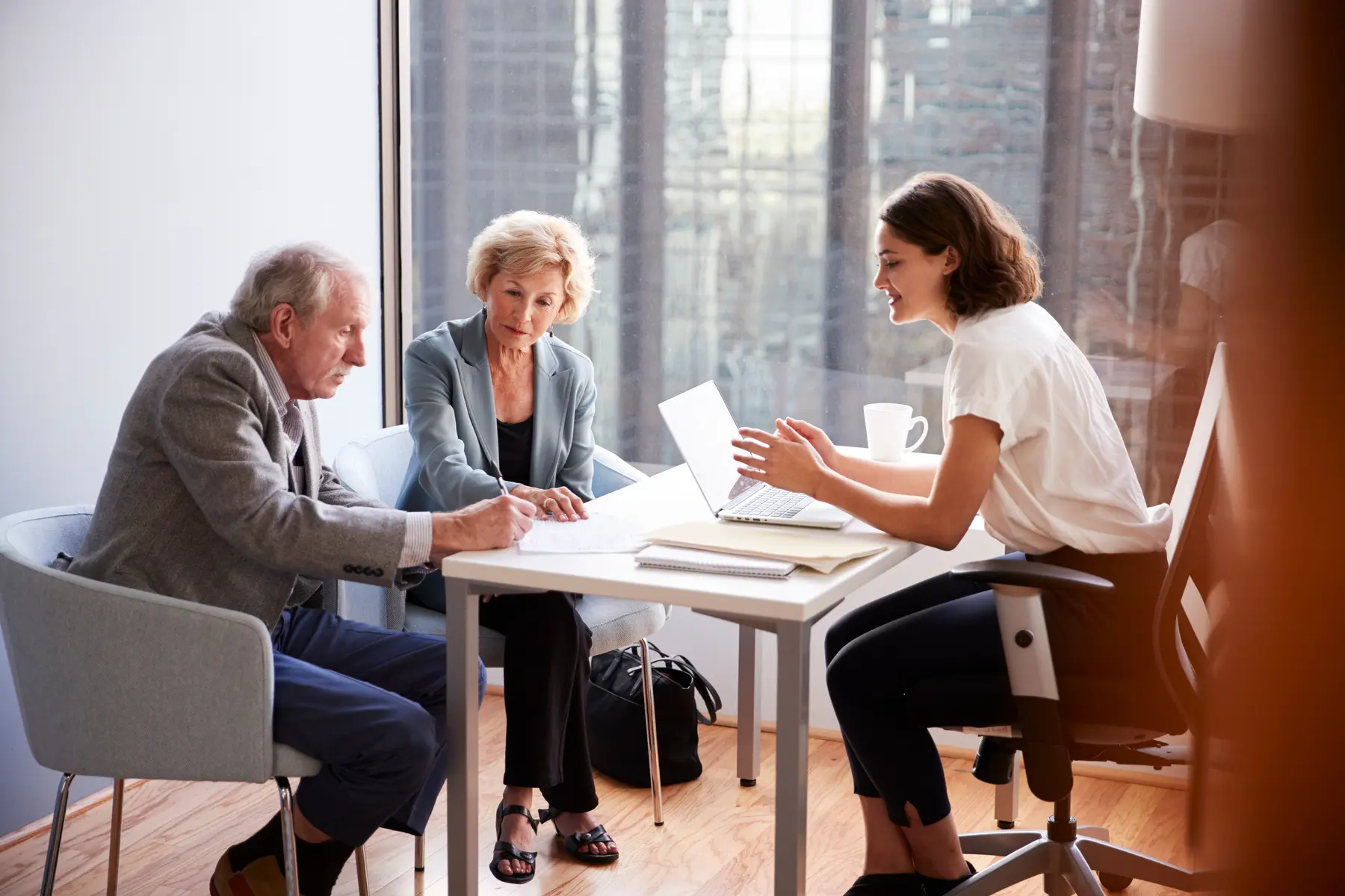 Older couple meeting with an estate tax adviser