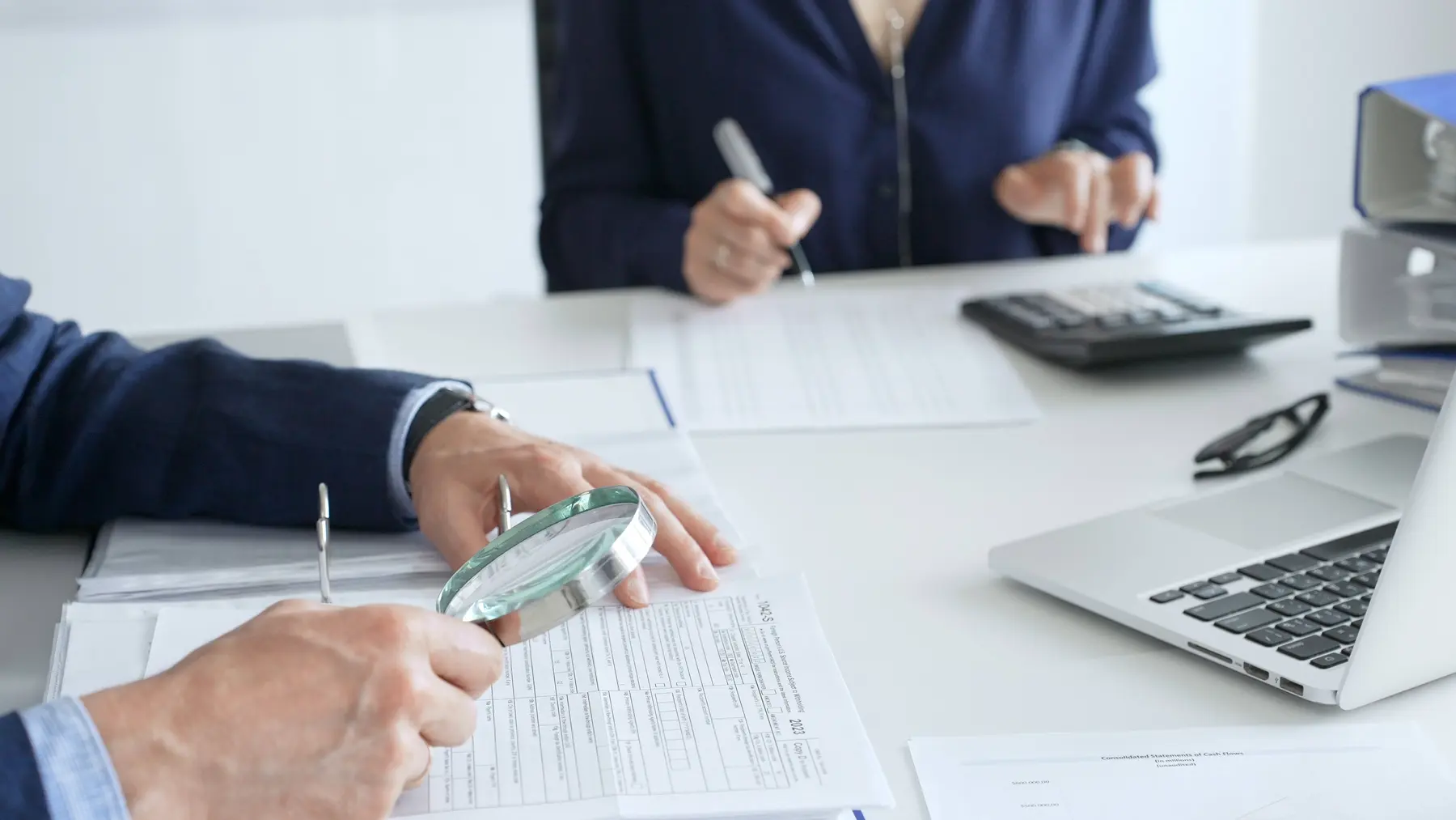 Accounting professionals reviewing financial documents