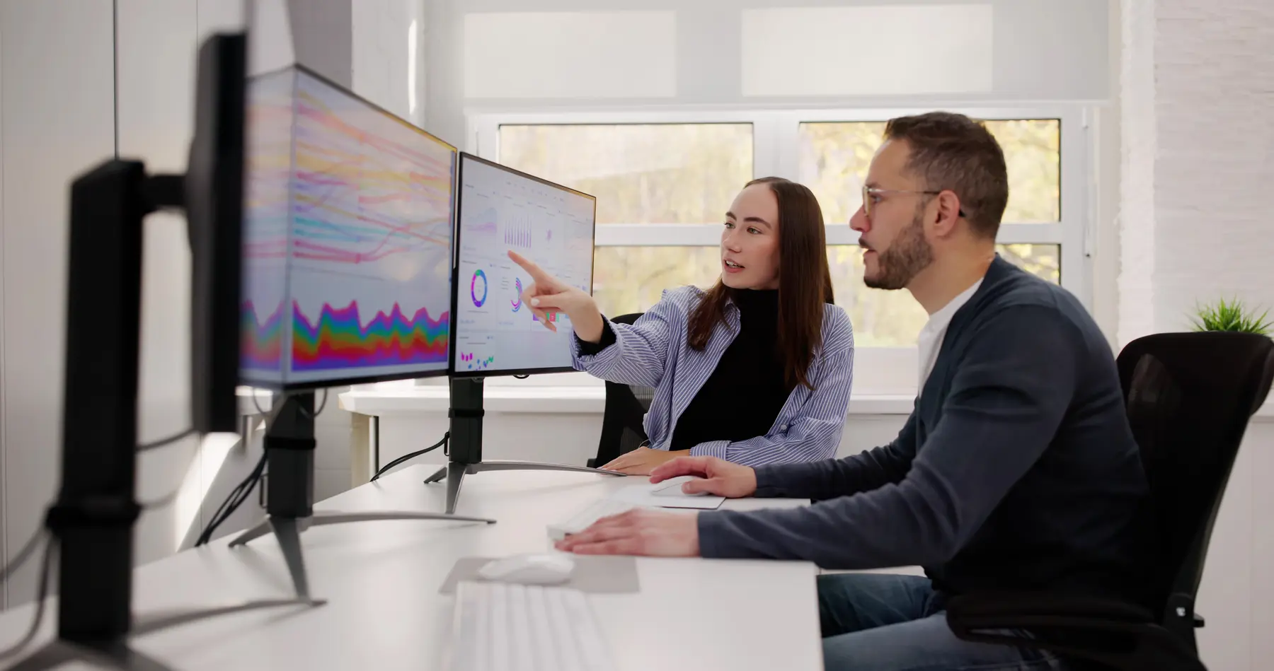 Risk advisers reviewing business data