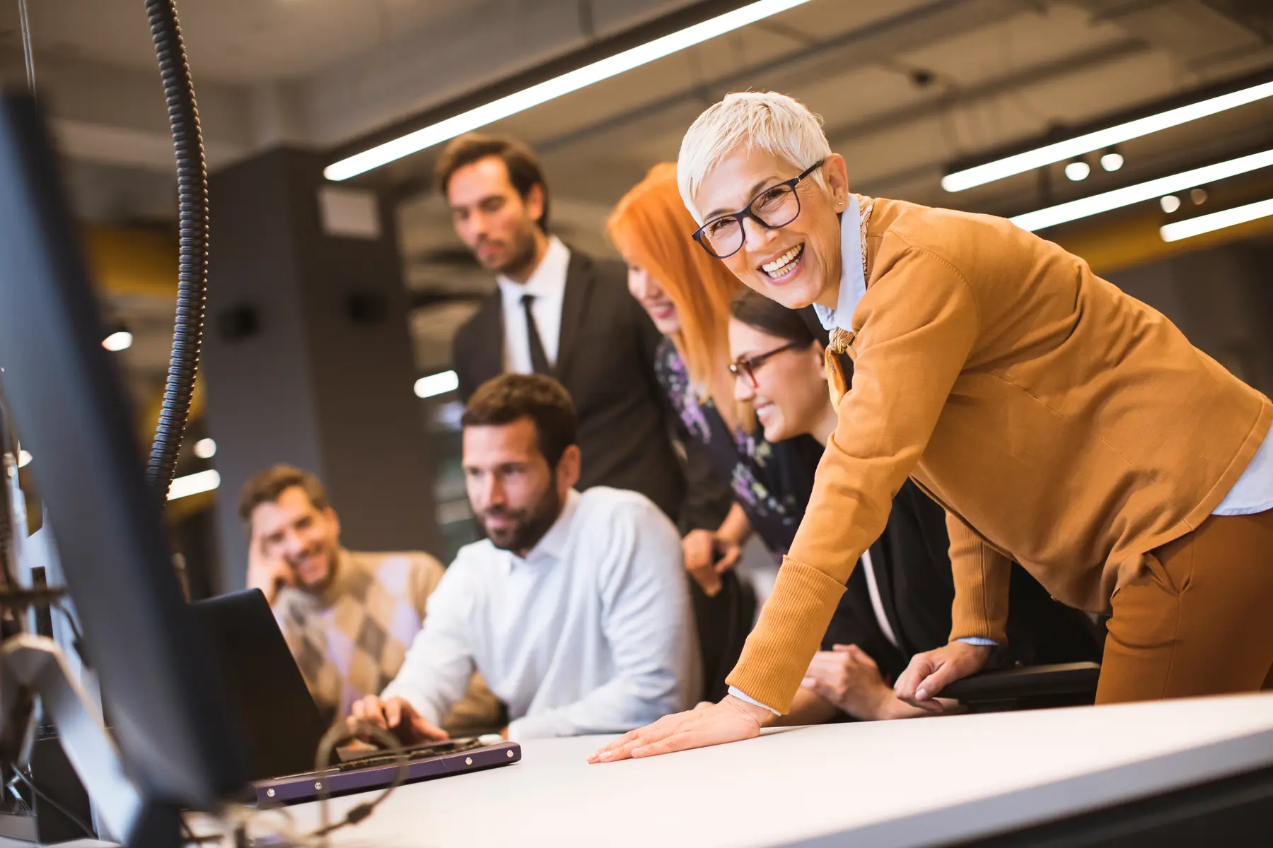 Business leaders collaborating with colleagues